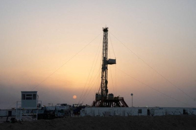 A general view shows an oil rig used in drilling at the Zubair oilfield in Basra, Iraq, July 5, 2022.